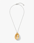 A silver chain necklace featuring a teardrop-shaped pendant made from a natural yellow oyster shell with a single white pearl nestled inside, shown against a clean white background.