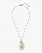 A silver chain necklace featuring a teardrop-shaped pendant made of natural iridescent pearl, shown against a light gray background.